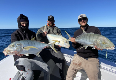 hervey bay sportfishing may june july newsletter - 3 guys holding fish caught on a sportfishing charter out of Hervey Bay QLD